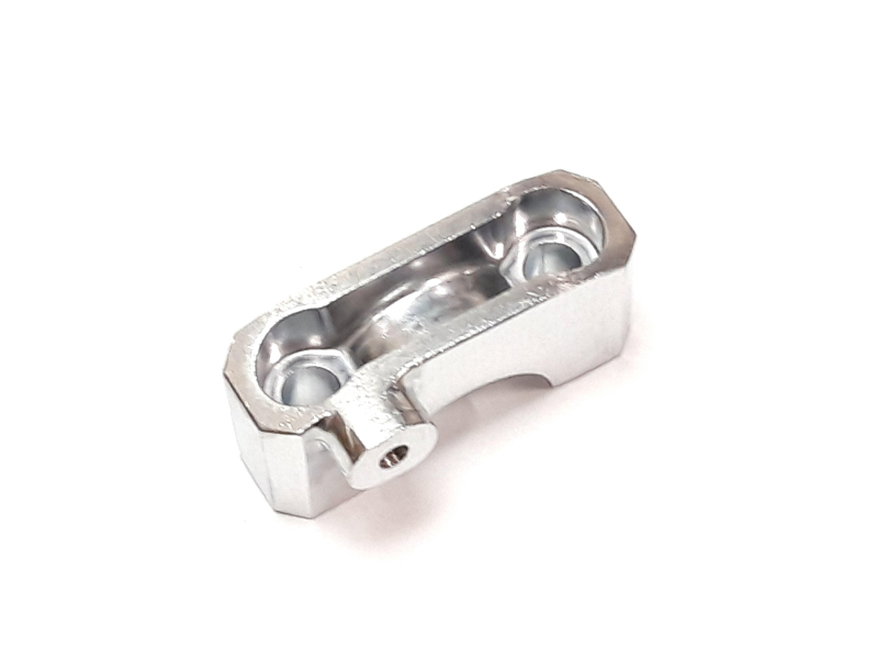 Оригінальна запчастина Linhai Left upper pressing block of handlebar (lead - zinc original color)